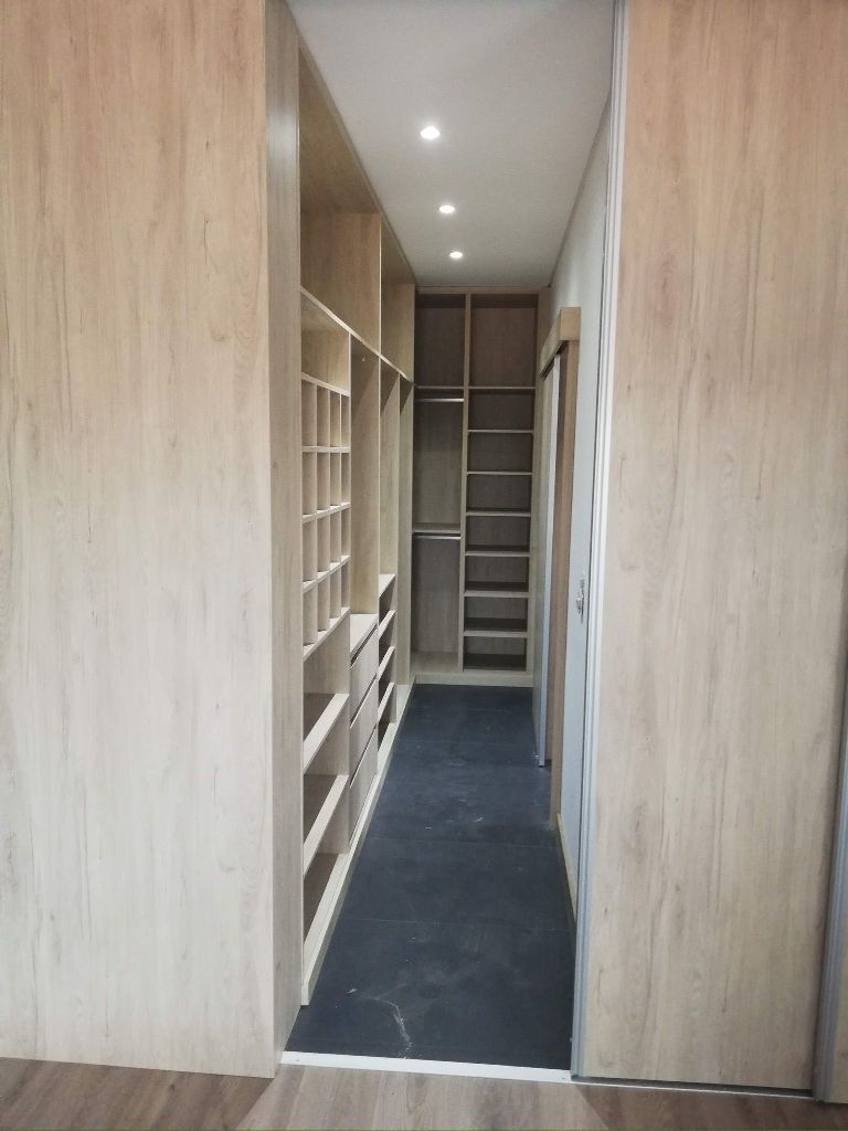 Walk-in closet por medida Sérgio Studio